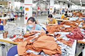 Myanmar employees seen working at a garment factory.